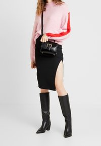 Lee Stickad tröja - light pink