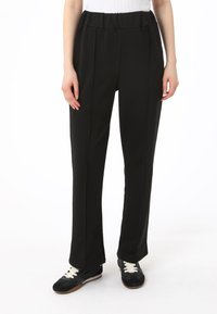 Modanisa BENIN - Pantalones deportivos - black