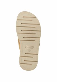 Beige rubber sole with horizontal grooves, raised rubber bands, and logo imprint. Features a rounded toe and textured surface for grip.