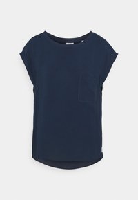 Top corto blu navy in morbido tessuto con scollatura rotonda e una piccola tasca sul lato sinistro; texture liscia e vestibilità comoda.
