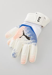 Puma målvaktshansker i hvit med bl�å og oransje prikkemønster. Gummiaktig grep med formet fingerbeskyttelse. Borrelåslukking.