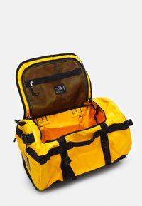 The North Face BASE CAMP DUFFEL S UNISEX - Reiseveske - summit gold/black