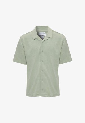 Short-sleeve, relaxed-fit shirt in soft sage green fabric with a smooth texture, button-down front, and classic collar.