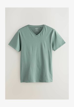 Korte mouwen, v-hals t-shirt in gedempt groen, gemaakt van zacht katoen. Soepele textuur, rechte zoom, met een label op de halslijn.