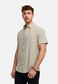 Short-sleeve, collared shirt in beige and grey vertical stripes, made of light fabric with wooden buttons and a relaxed fit design.