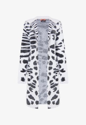 Fluffy cardigan in het wit met zwart dierenprint en strepen; open voorkant ontwerp met lange mouwen en zachte textuur.