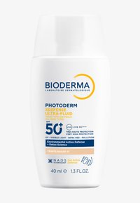 Bioderma Photoderm XDefense Ultra-Fluid protezione solare, 40 ml, bottiglia cilindrica bianca con testo blu e giallo, SPF 50+, design elegante e minimalista.