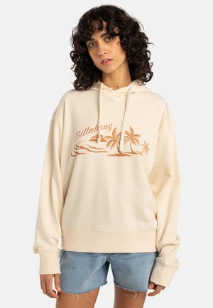 Beige hoodie gemaakt van zachte stof, met een geborduurd ontwerp van een zonsondergang en palmbomen in roestkleur. Losse pasvorm met ribgebreide boorden.