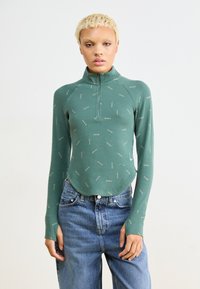 Nike Sportswear LOGO - Vesta - vintage green/light army