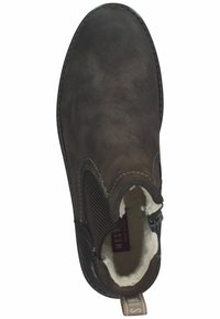 Botín de cuero marrón hasta el tobillo con paneles laterales elásticos, punta redonda y forro interior suave. Cuenta con un lazo para poner y quitar fácilmente.