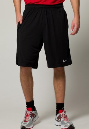 Zwarte sportshorts met een elastische tailleband en zijzakken. Voorzien van een klein wit Nike-logo op het linkerbeen.