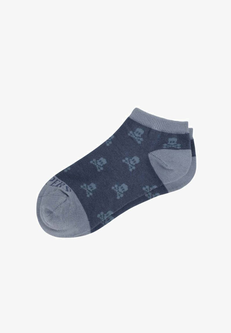 Chaussette gris foncé arrivant à la cheville avec talon, orteil et bordure gris plus clair, ornée d'un motif répété de crânes et os croisés.