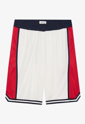 Shorts de sport blancs avec des panneaux latéraux rouges, une taille bleu marine et des ourlets rayés. Fabriqués en tissu léger, présentant une surface texturée.
