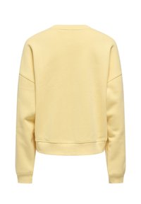 Effen lichtgeel sweatshirt met ronde hals, lange mouwen, geribbelde manchetten en zoom, gezien van achteren op een witte achtergrond.