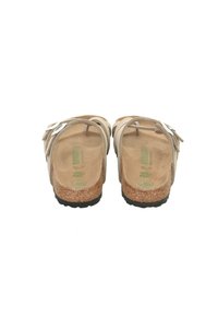 Brown suede sandals with a cork sole, two adjustable straps with silver hardware, and a textured footbed. Flat with a durable black rubber outsole.