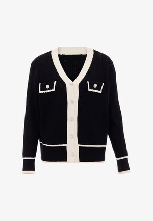 Musta neulecardigan valkoisilla yksityiskohdilla, jossa on V-pääntie, kaksi etutaskua ja koristeelliset napit. Rakenteellinen kangas, jossa on ribbitettu muotoilu.