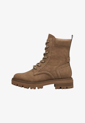 Brown ankle boot made of synthetic material, featuring a lace-up design, textured side panels, and a rugged, chunky sole.