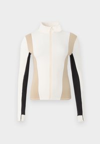 Viegls zip-up jaciņš, kas izgatavots no gludas auduma. Iezīmēts ar krāsu blokiem krēmkrāsā, bēšā un melnā ar kontrastējošām baltām vīlēm.