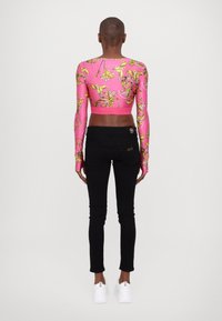 Versace Jeans Couture Topper langermet - rosa