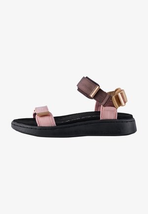 Sandal featuring pink and brown fabric straps, gold accents, black rubber sole, and textured insole. Adjustable strap design for fit.