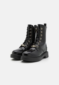 Love Moschino NEW CITY LOVE - Botas de tornozelo com plataforma - nero