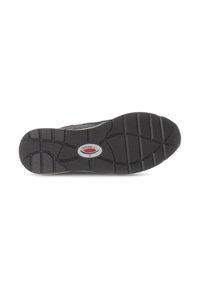 Black rubber shoe sole with textured pattern, including grooves and ridges for traction. Features a circular logo in the center.