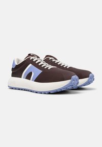 Dark brown sneakers with a textured upper, light blue accents, and white rubber soles. Features round laces and a cushioned design.