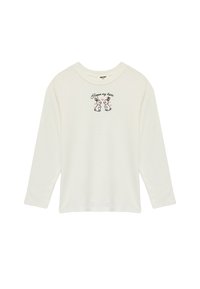 Langærmet, krämfarvet t-shirt lavet af blødt stof med en frontbrodering af to kaniner og teksten "Forgive my cutie."
