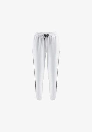 Pantalones de chándal blancos con cintura elástica, cordón negro, puños en los tobillos ajustados y finas rayas negras a lo largo de los lados exteriores.