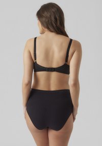 Black bra with adjustable straps and a band closure, paired with matching high-waisted black briefs. Smooth texture without patterns.