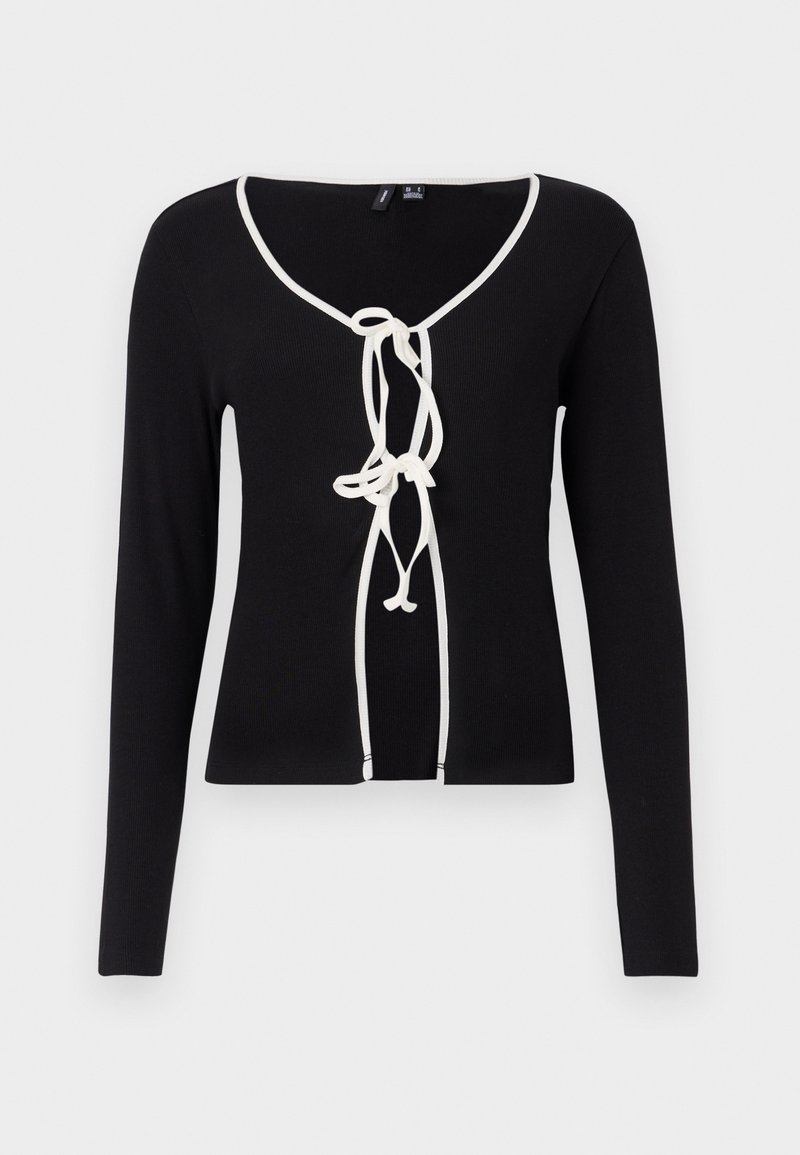 Maglietta nera a maniche lunghe con scollatura a V, caratterizzata da bordi bianchi e una chiusura decorativa con lacci sul davanti. Realizzata in un tessuto a costine.