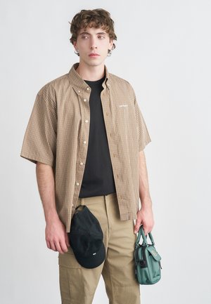 Pluus - hamilton brown