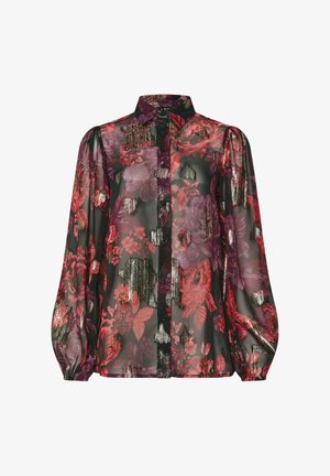 Blusa negra transparente con patrones florales vibrantes en rojo y púrpura, con un frente de botones, mangas largas abullonadas y detalles texturizados.