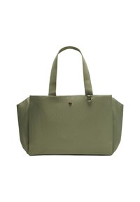 Világoszöld vászontáska, két közepes hosszúságú fülekkel, texturált felülettel és egy kis logó részlettel az elején. Tágas kialakítás, egyszerű forma.