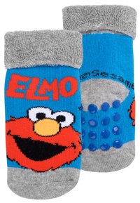 Calze per bambini con corpo blu, risvolto grigio, grafica di Elmo e puntini antiscivolo in gomma sulle suole per migliorare la presa. Materiale misto cotone.