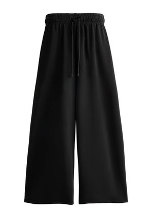Pantaloni neri a gamba larga realizzati in tessuto elasticizzato. Presentano una cintura con coulisse elastica e texture lisce senza motivi visibili.