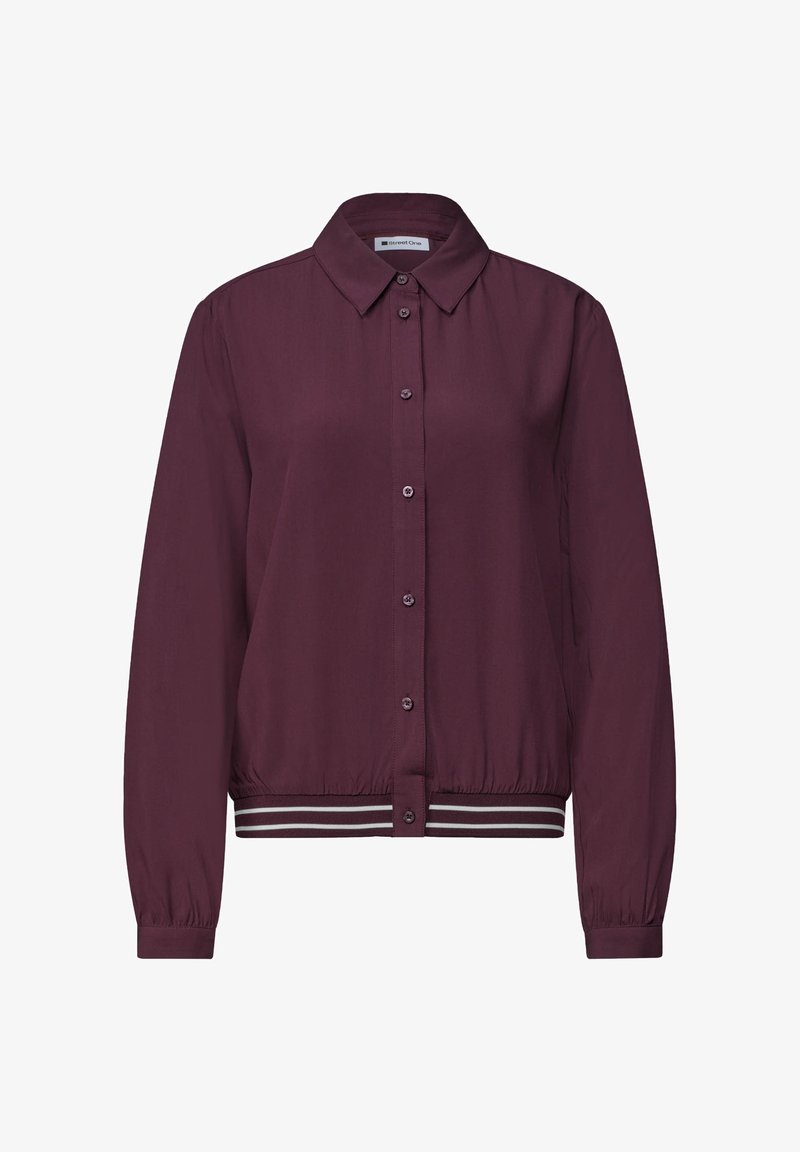 Chemise à manches longues violet foncé avec boutons, col et taille élastique avec deux bandes blanches sur fond blanc.
