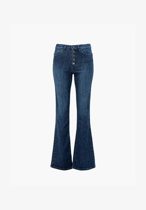 Ciemnoniebieskie dzwony z denimu z wysokim stanem, zapinane na pięć guzików, z przednimi kieszeniami i lekko spranym wykończeniem.