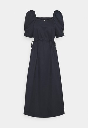 Robe bleu marine avec manches bouffantes, décolleté carré et taille cintrée. Fabriquée en tissu lisse, avec une jupe longue et fluide.