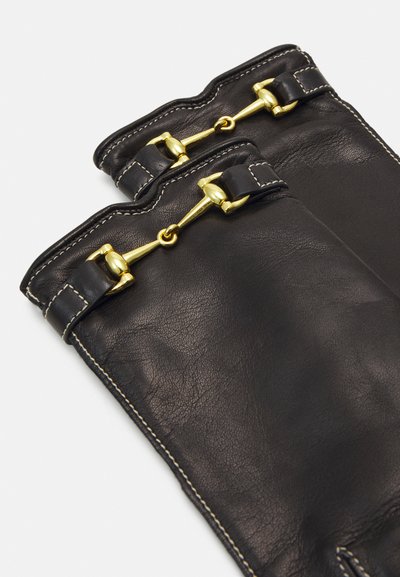 Schwarze Lederhandschuhe mit goldenen Verschlüssen, genähten Details und einer glatten Textur in einem figurschmeichelnden Design.
