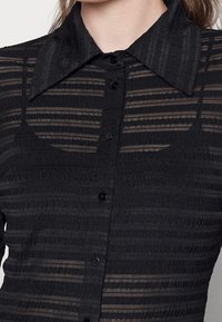 Résumé Abito a camicia - black