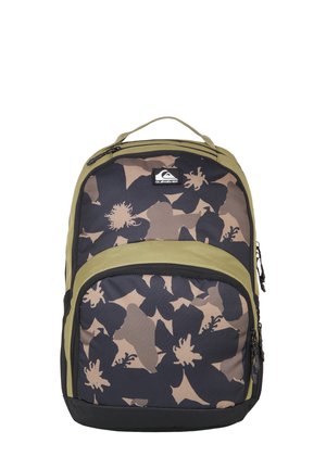 Backpack with a floral camouflage pattern in dark blue, brown, and olive green. Features a prominent logo, zippered pockets, and a sturdy handle.