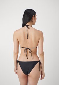 Hunkemöller DOHA TRIANGLE - Bikinio viršutinė dalis - black