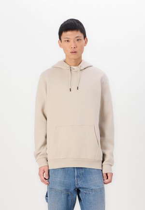 Sweatshirt beige à capuche avec une poche avant, coupe décontractée et détails à cordon de serrage. Fabriqué en tissu doux avec des poignets et un ourlet côtelés.