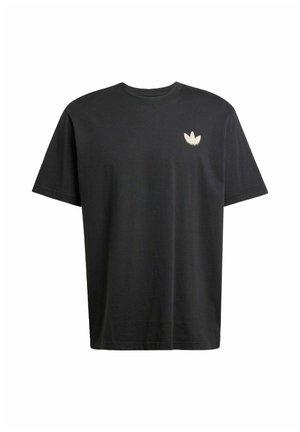 Sort bomulds t-shirt med en afslappet pasform, der har et lille cremefarvet emblem på venstre bryst. Korte ærmer og rund halsudskæring.