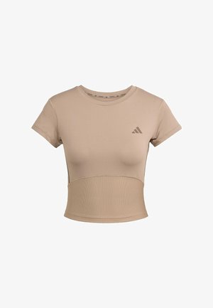 Beige sportieve cropped t-shirt met korte mouwen, geribbelde onderzijde en subtiele logo op de borst. Soepele textuur, aansluitend ontwerp.