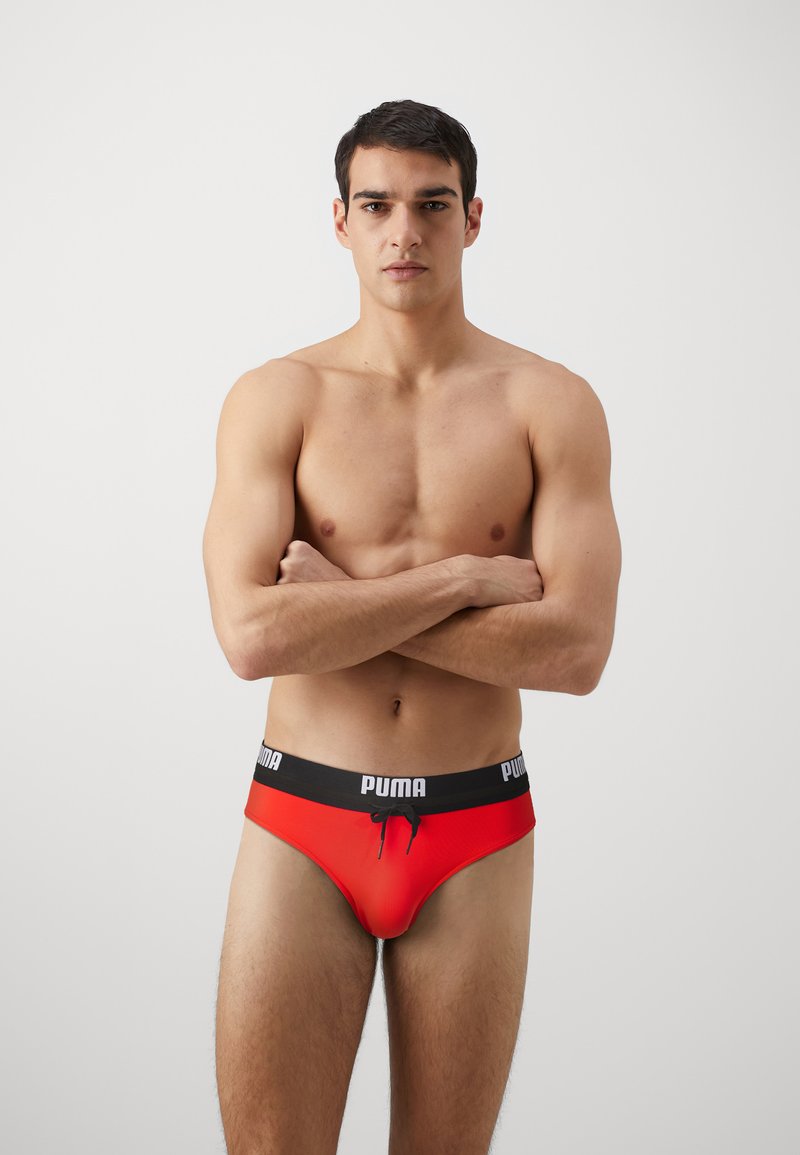 Puma SWIM MEN LOGO BRIEF - Plavky slipy - red