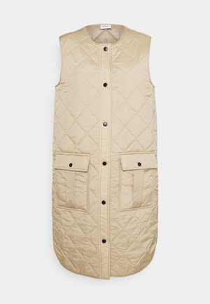 Beige sleeveless quilted long vest with front snap buttons and two flap pockets with snap closures.