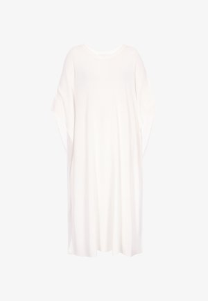 Tunică albă supradimensionată cu croială lejeră, decolteu rotund și mâneci scurte. Confecționată dintr-un material ușor și texturat. Fără modele vizibile.