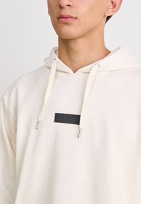 Ellesse VARI - Mikina s kapucňou - oatmeal marl